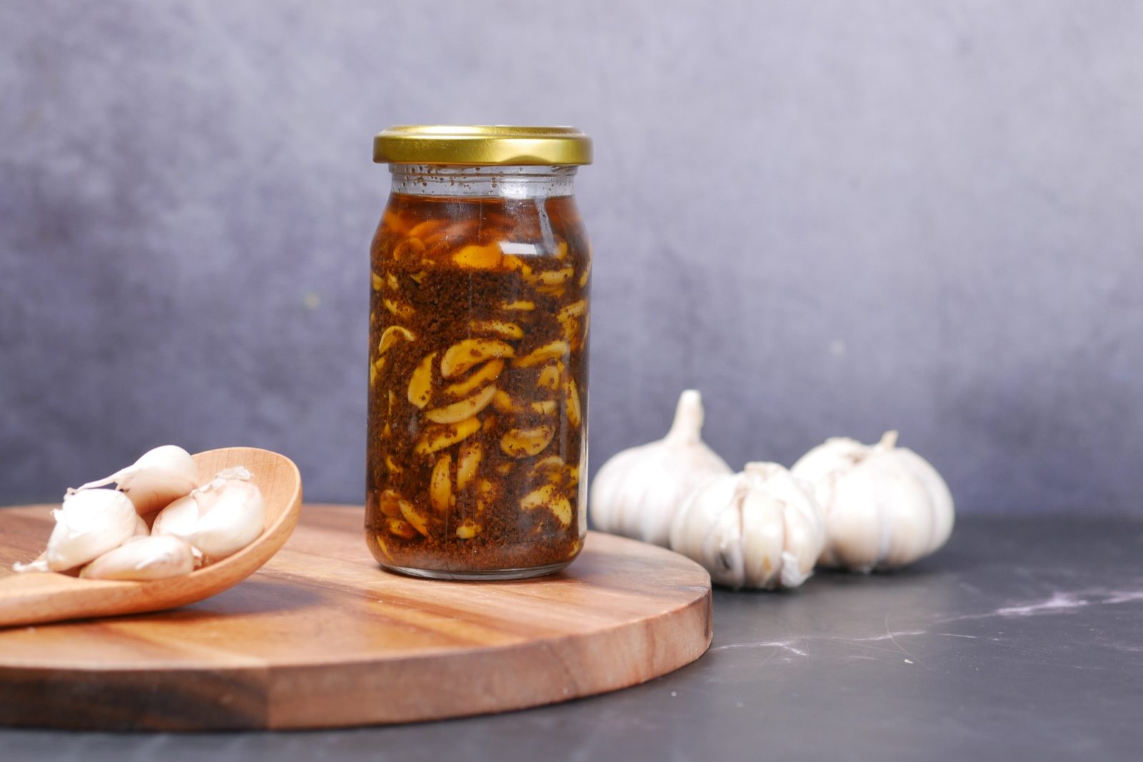 Garlic steeping in a glass jar